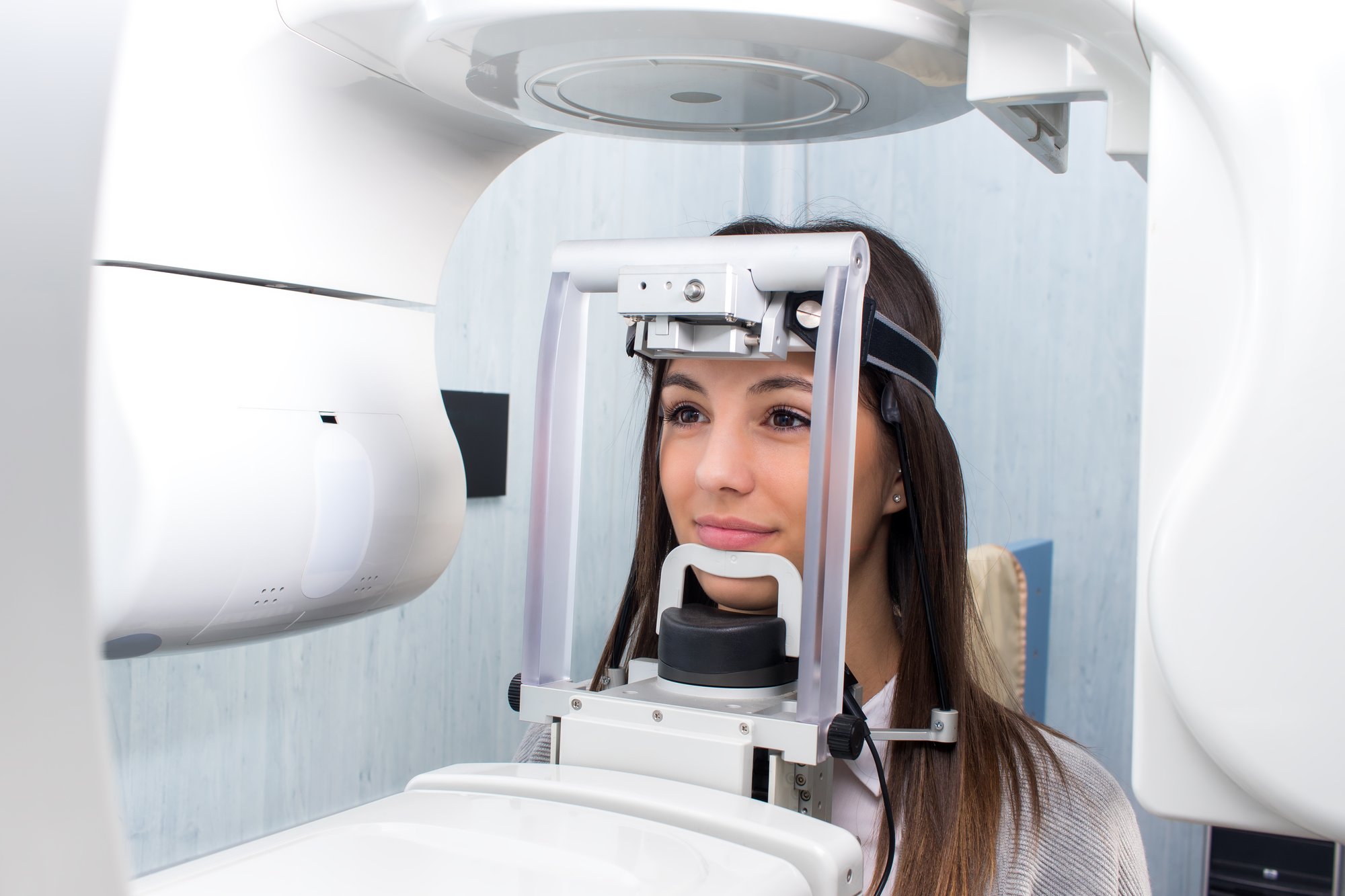 Digital dental X-ray images on a monitor during a dental exam